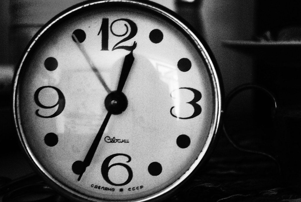 Vintage black and white alarm clock